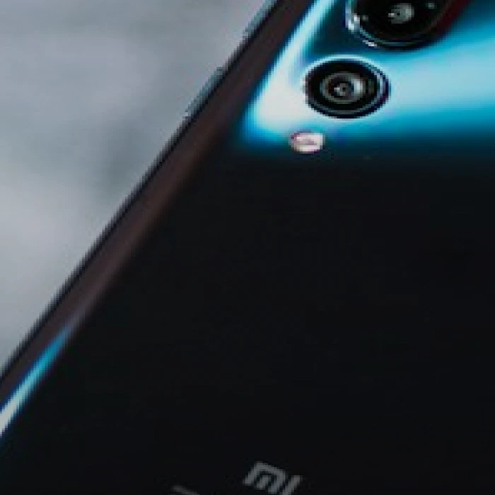 Teal Smartphone · 128 GB